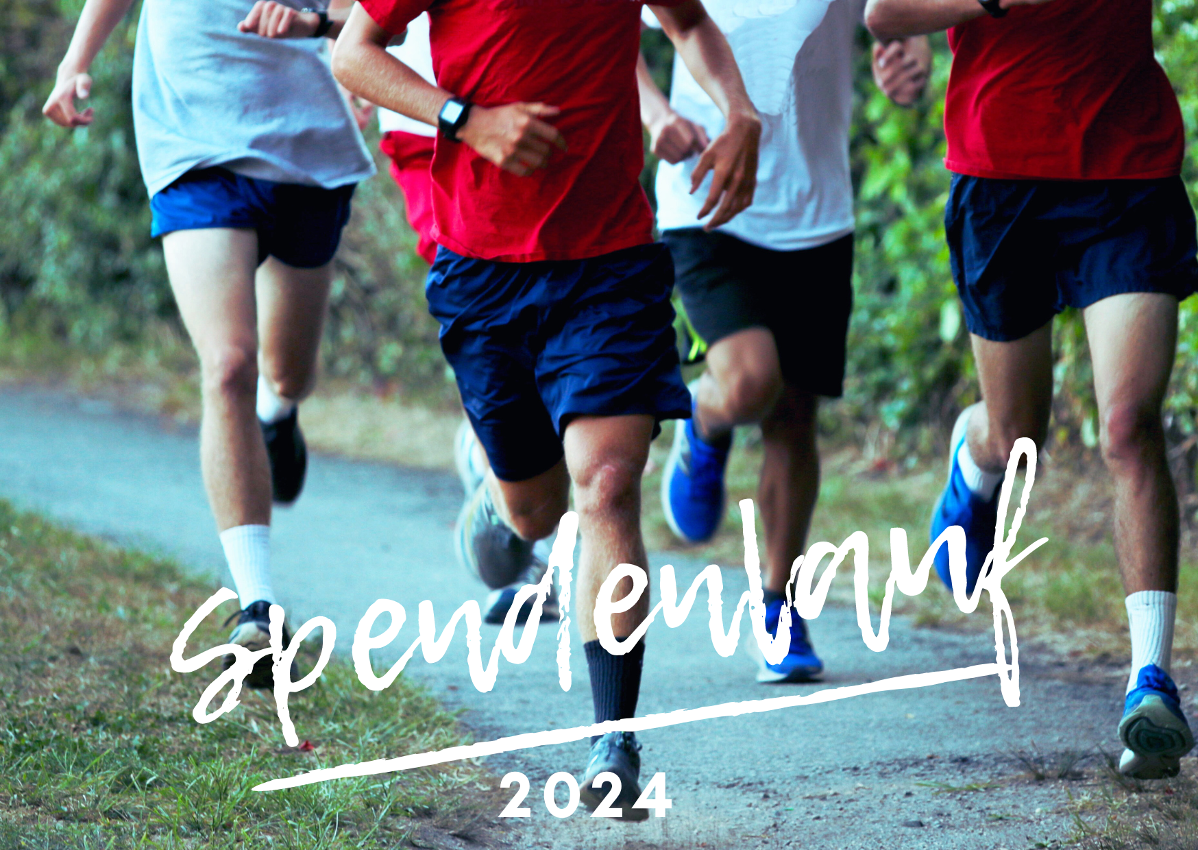 Läufer beim Spendenlauf 2024 auf einem Weg im Freien, sie tragen Sportkleidung.