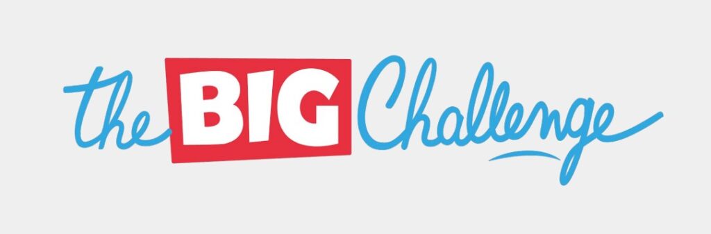 Logo mit dem Text „the BIG Challenge“ in rot und blau auf einem grauen Hintergrund.